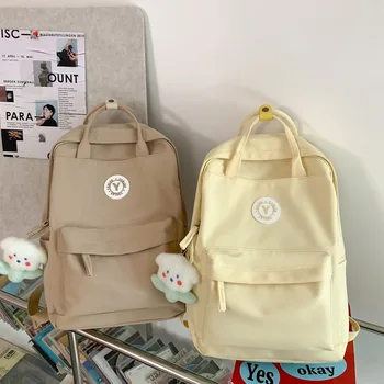2023 Японские милые студенты школьный рюкзак отправить бесплатный кулон студенты колледжа старшеклассники сплошной цвет шикарный рюкзак через плечо